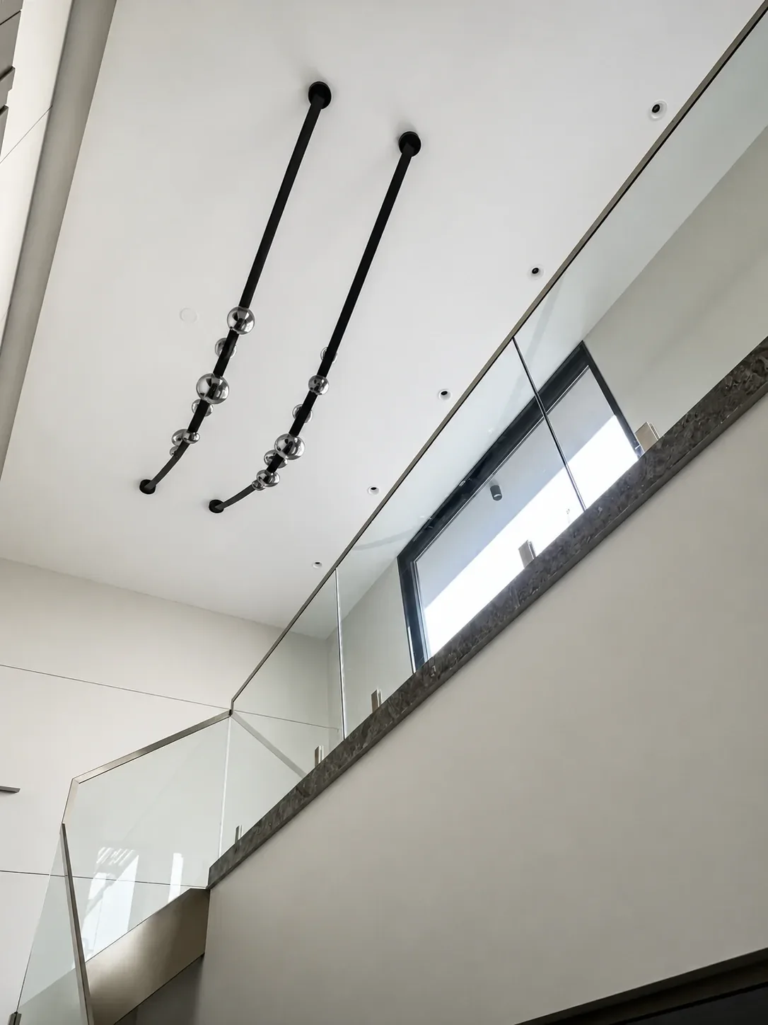 Double-Height Staircase & Glass Railings reference 10